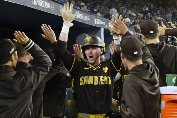 Padres snag playoff berth with extra-innings walk-off win vs. Brewers