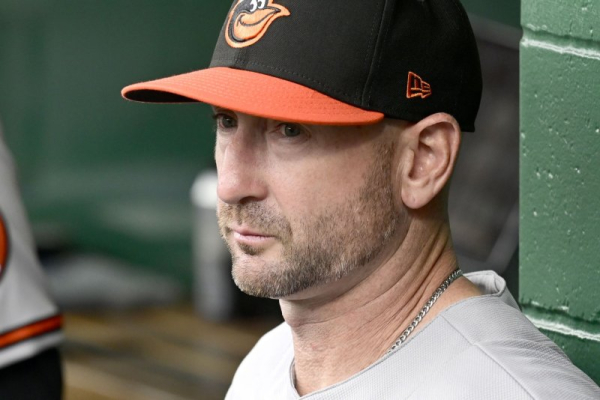 Baltimore Orioles manager Craig Albernaz OK after line drive hits face