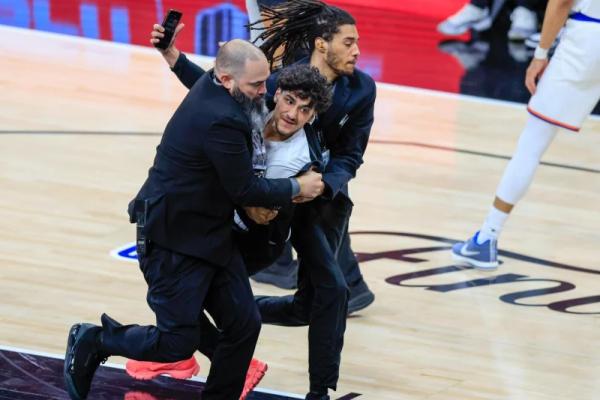 NBA bans spectator after he rushes onto court during Game 1 of Finals NBA bans spectator after he rushes onto court during Game 1 of Finals