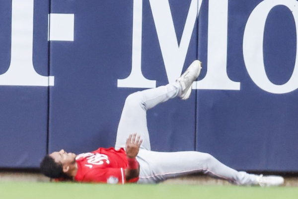 Reds' Dane Myers avoids broken bones from wall collision
